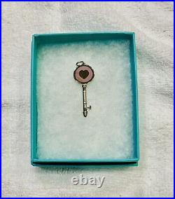 Beautiful Tiffany & Co Sterling Silver Enamel Tiffany Pink Heart Key Pendant
